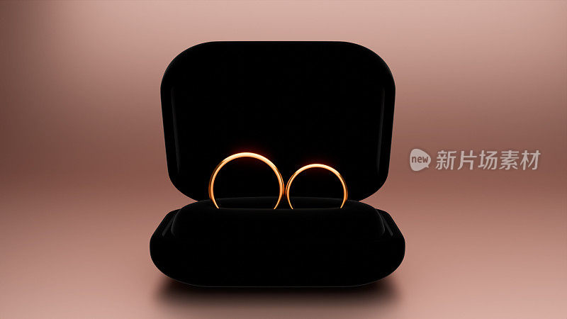 婚礼礼盒里的一对结婚金戒指。3 d渲染。